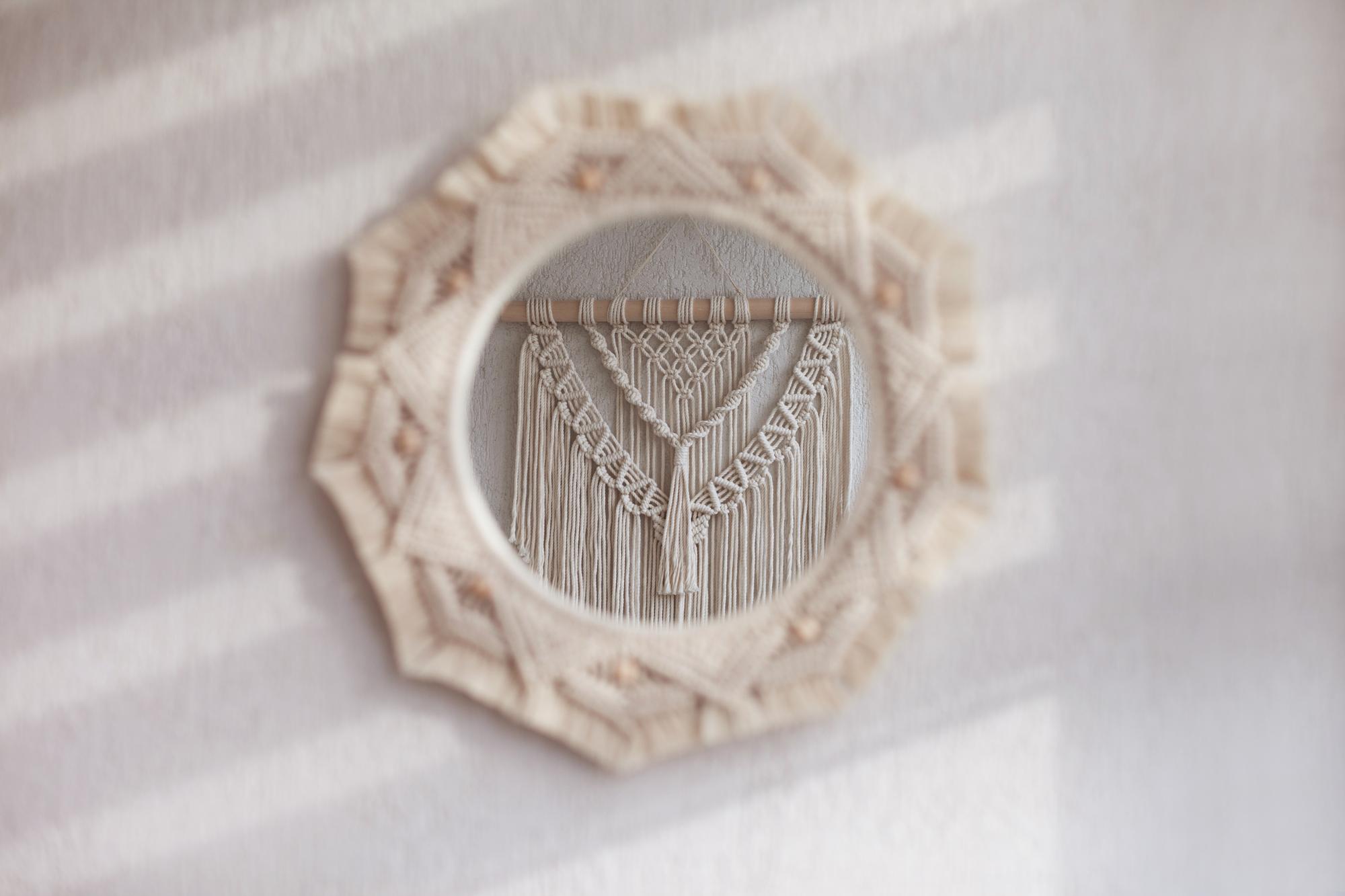 Minimal embroidered badge with geometric motif on linen