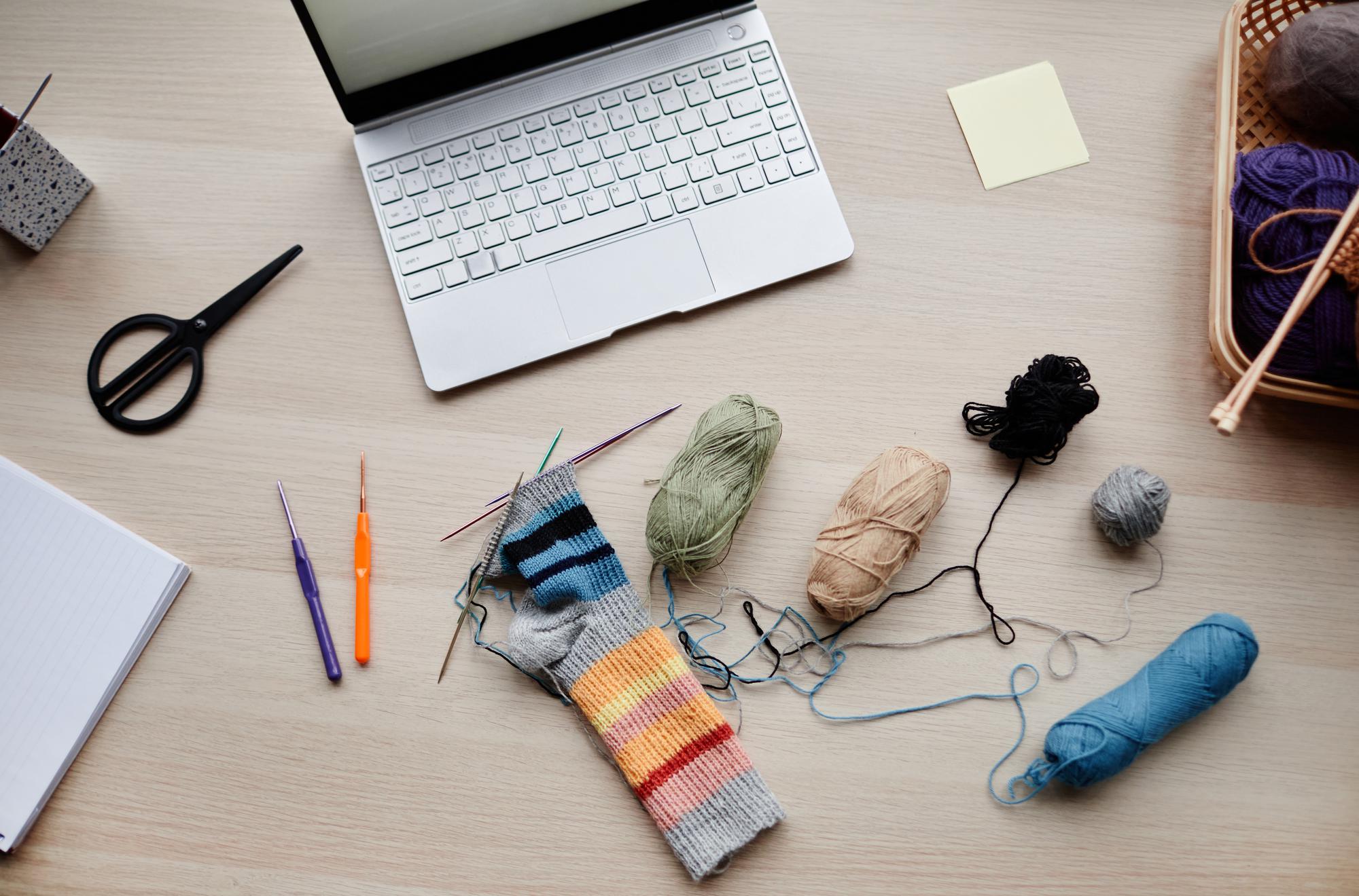Clean studio workspace with samples and laptop